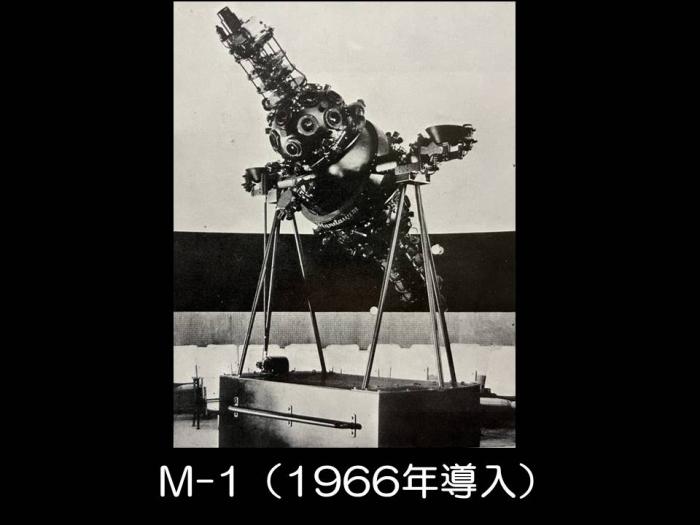 M-1